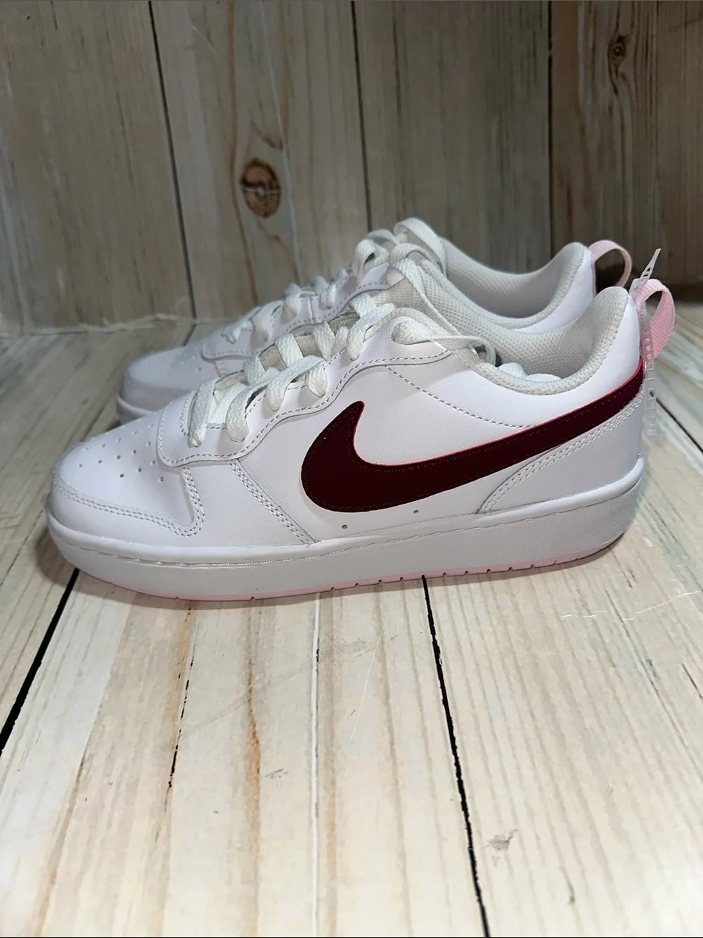 Nike White Sneakers with Maroon Swoosh and Pink Heel Tab